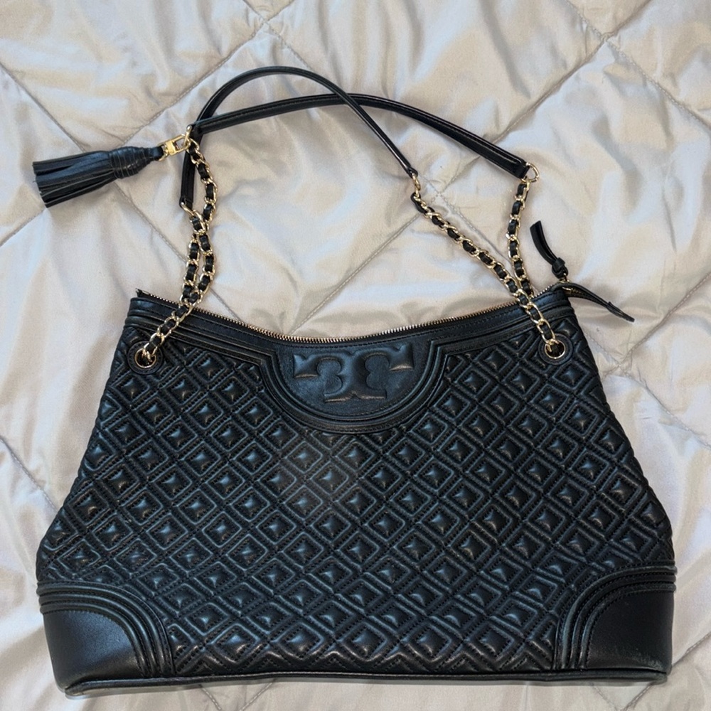 Black and gold Tory Burch purse